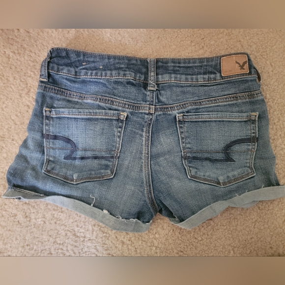 Bundle of four shorts size 4. Levi's, American Eagle,  Express. - Picture 6 of 15